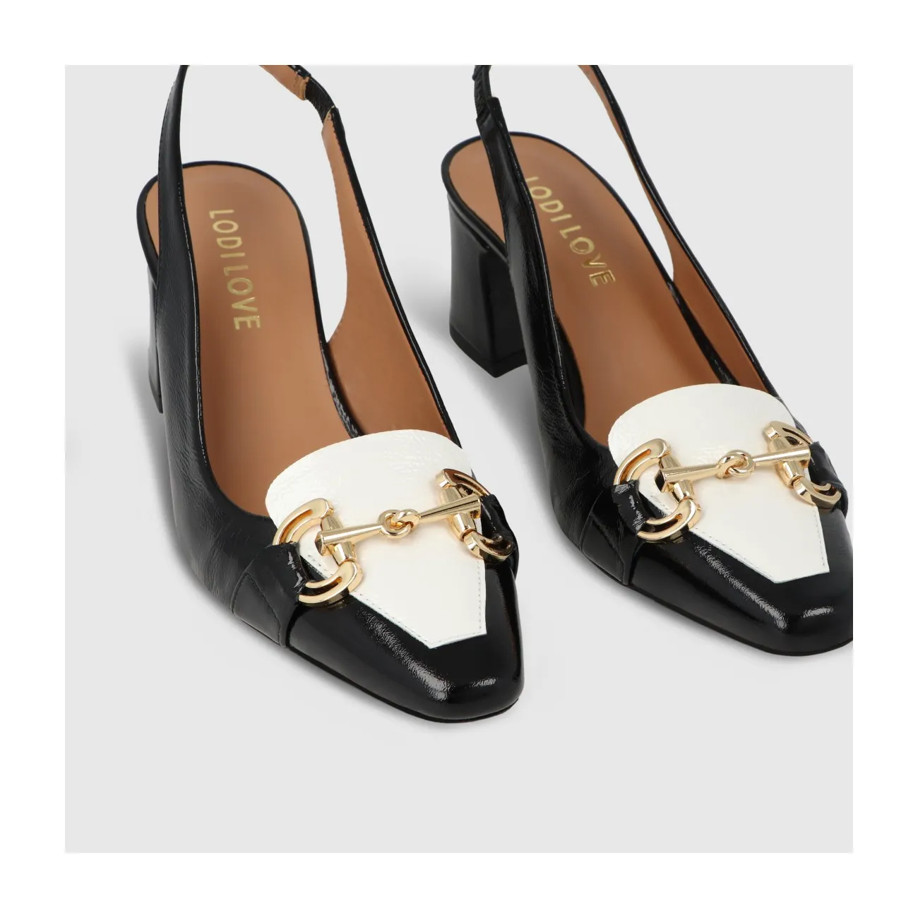 Escarpin slingback pour femme en cuir effet cuir verni combiné noir et blanc. I LODI Chaussures pour femme online.